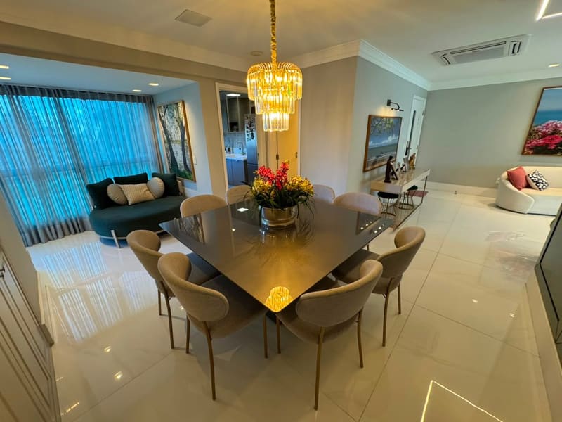 Dining area with chandelier and city views