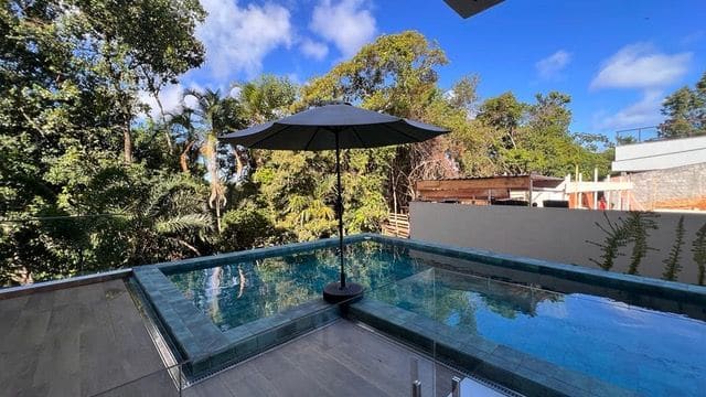 Pool with sun umbrella