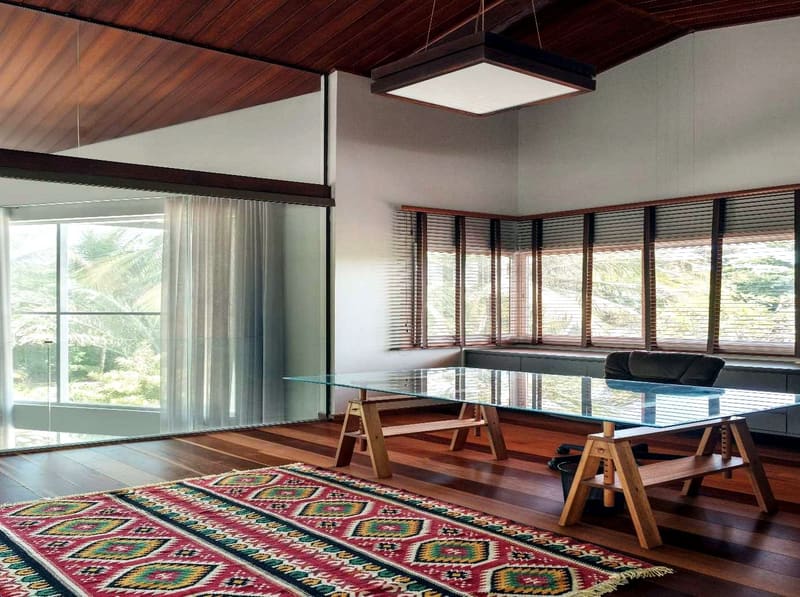 Upper-floor room with garden views