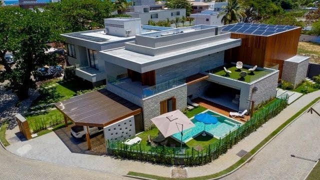 Aerial view of the house, pool and grill terrace