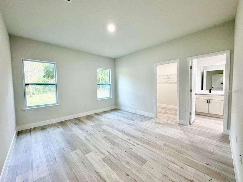 Primary bedroom with en-suite bathroom