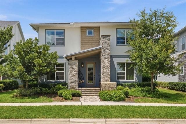 Fachada da casa de dois andares em Laureate Park, Lake Nona