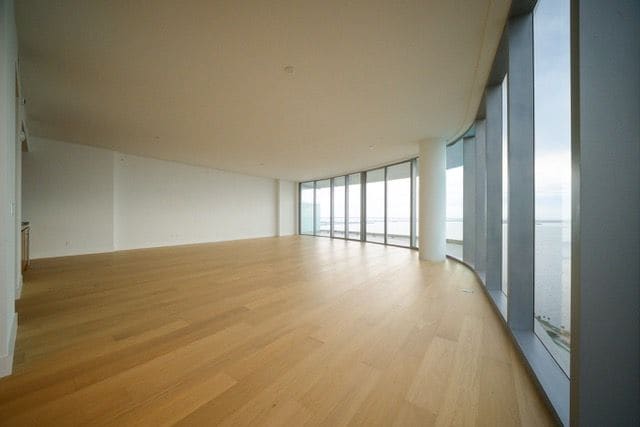 Living area with floor-to-ceiling glass