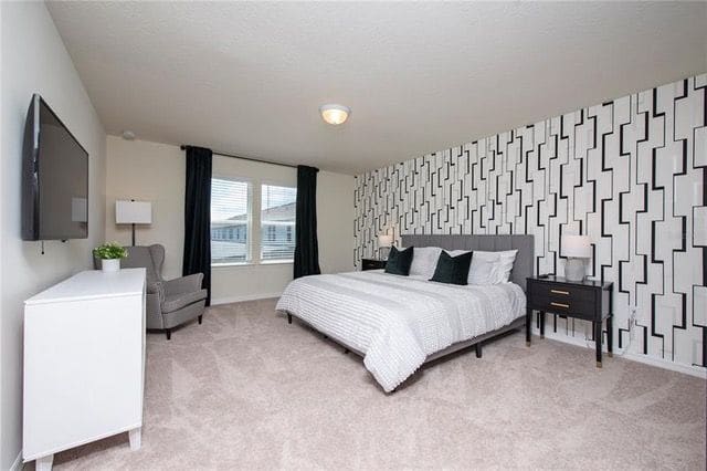 Bedroom with patterned wallpaper
